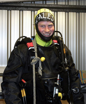 Britain's Prince Harry smiles during his visit to the Royal Navy's fleet diving squadron at Horsea Island in Portsmouth, southern England, Oct. 31, 2007. It was Prince Harry's first official visit since becoming Commodore-in-Chief of small ships and diving.