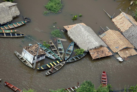 Brazil rushes to aid flood victims, 32 dead