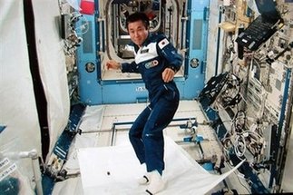 Japan astronaut tests 'flying carpet' in space