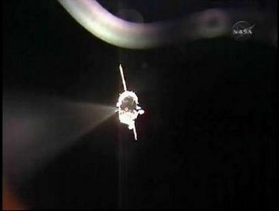 Russian manned spaceship docks with space station