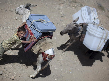 NATO to keep guns quiet on Afghan election day