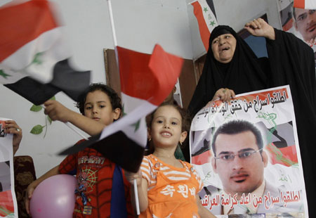 Shoe-throwing Iraqi reporter set to be released