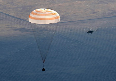 Russian spacecraft with circus tycoon lands safely
