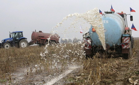 Czech farmers dump milk to protest price slump