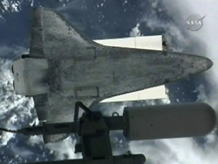 Shuttle Atlantis arrives at space station