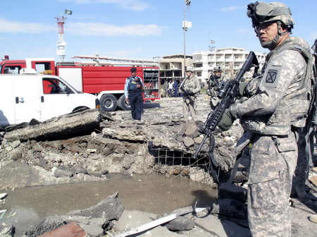 Car bomb hits Baghdad police crime lab, 21 dead