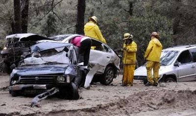 Mudslides sweep away cars, assault homes near LA