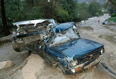 Mudslides sweep away cars, assault homes near LA