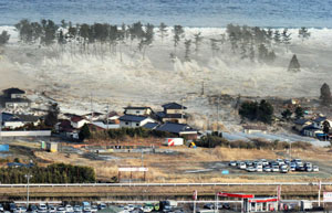 Over 1,000 feared killed by quake, tsunami