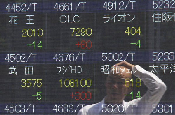 Asian stocks lower after Wall Street tumbles