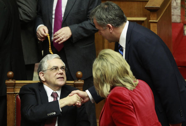 Greek parliament approves debt deal