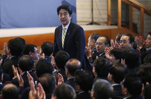 Japan's Ex-PM Abe known for tough stance