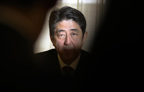 Abe vows to improve Sino-Japanese ties