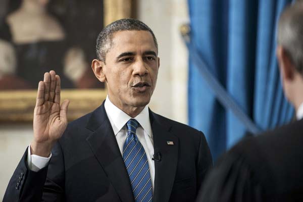 Obama sworn in at low-key White House ceremony