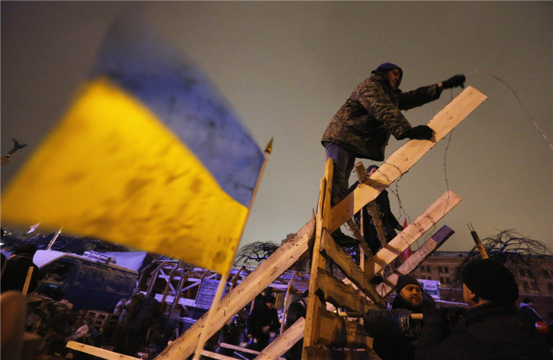 Ukraine says it won't use troops against protesters