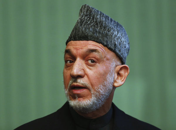 Afghanistan's Karzai in secret talks with Taliban - report