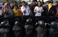 Thai protesters target businesses linked to PM