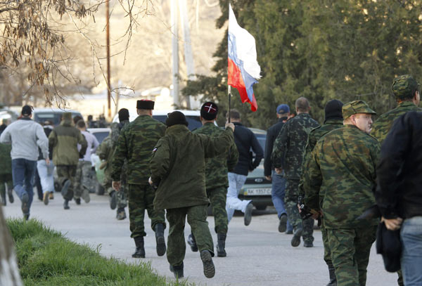 Russian troops seize Crimea airbase