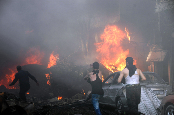 Two car bombs kill 25 in Homs