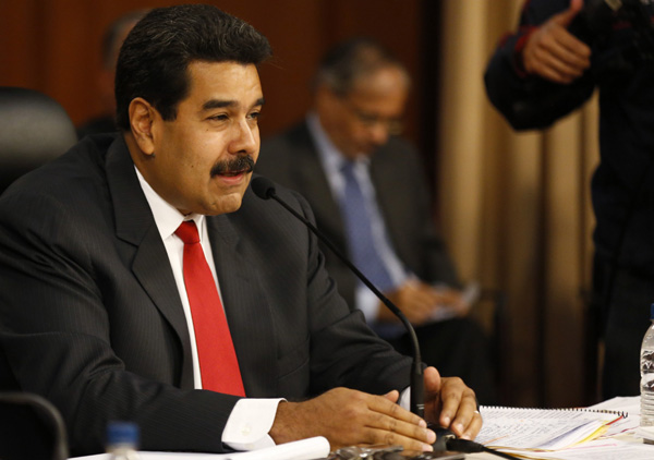 Venezuela's Maduro and opposition hold talk