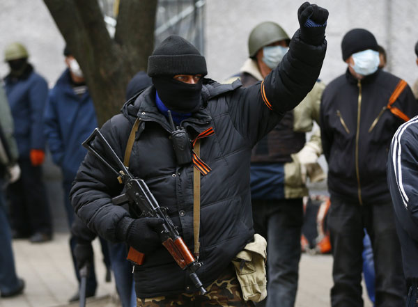 Armed men seize two government buildings in eastern Ukraine