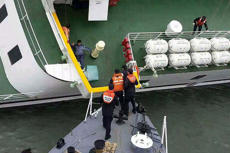 Passengers rescued by South Korean maritime policemen