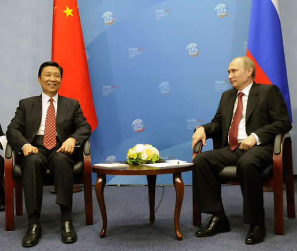 Putin says Russia-China ties enter new stage