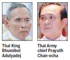 Thai coup leader backed by king, warns citizens