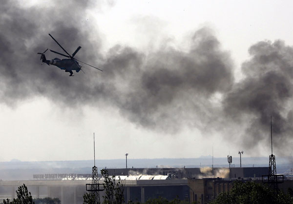 Dozens killed in fighting at airport in Donetsk