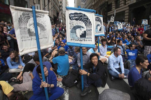 Climate protesters arrested in march on Wall Street