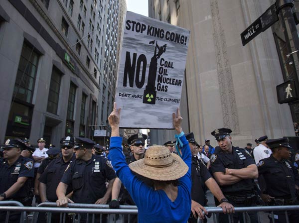 Climate protesters arrested in march on Wall Street