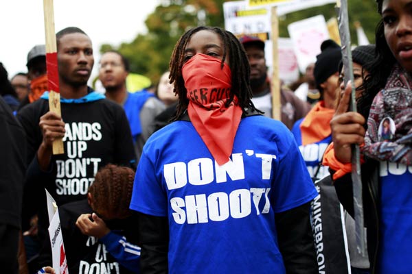 Arrests made in protests against killing of black young man in US