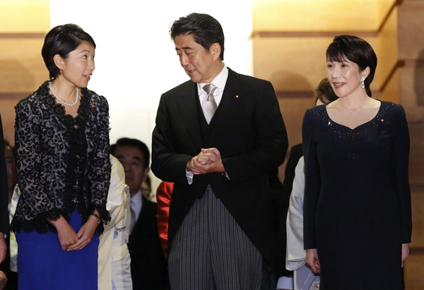 Abe accepts trade minister Obuchi's resignation