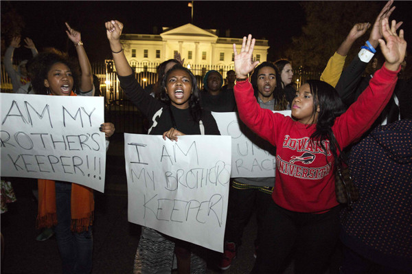 Thousands rally across US after Ferguson decision