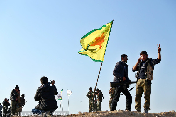Islamic State group nearly pushed out of Syria's Kobani