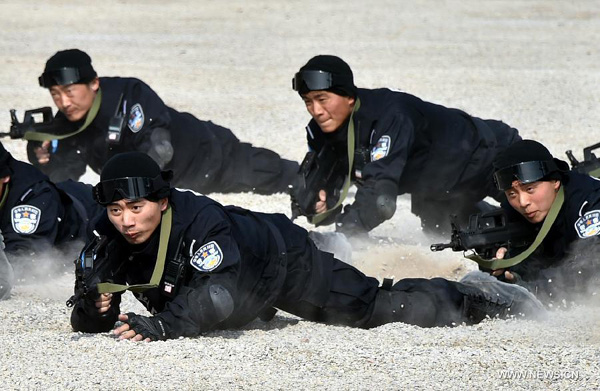 Riot police hone skills before heading for peacekeeping mission