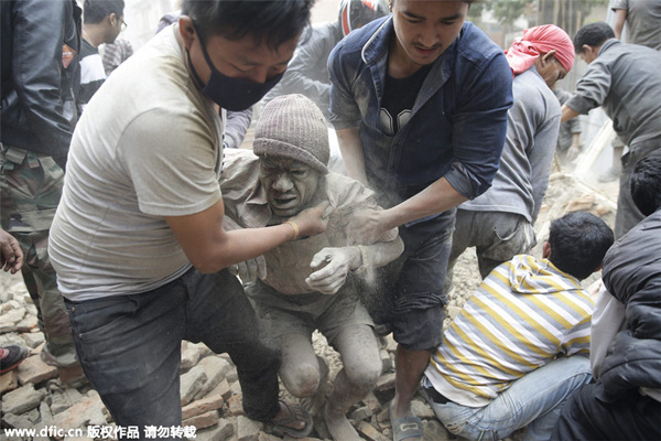 Nepalese dig with bare hands for quake survivors as toll rise