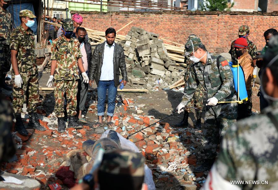 Chinese rescuers work on outskirts of Kathmandu, Nepal