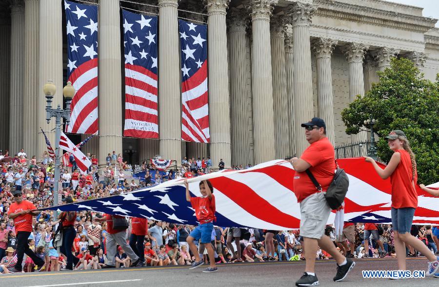 People take part in Independence Day parade in Washington