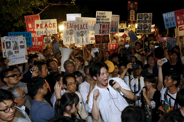 Demonstrators protest against Abe's security bills