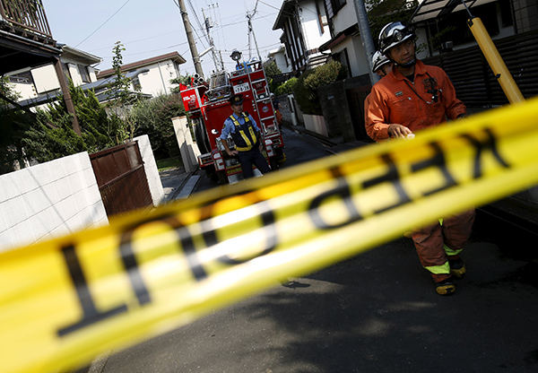 Small plane crashes in Tokyo neighborhood; 3 dead, 3 survive