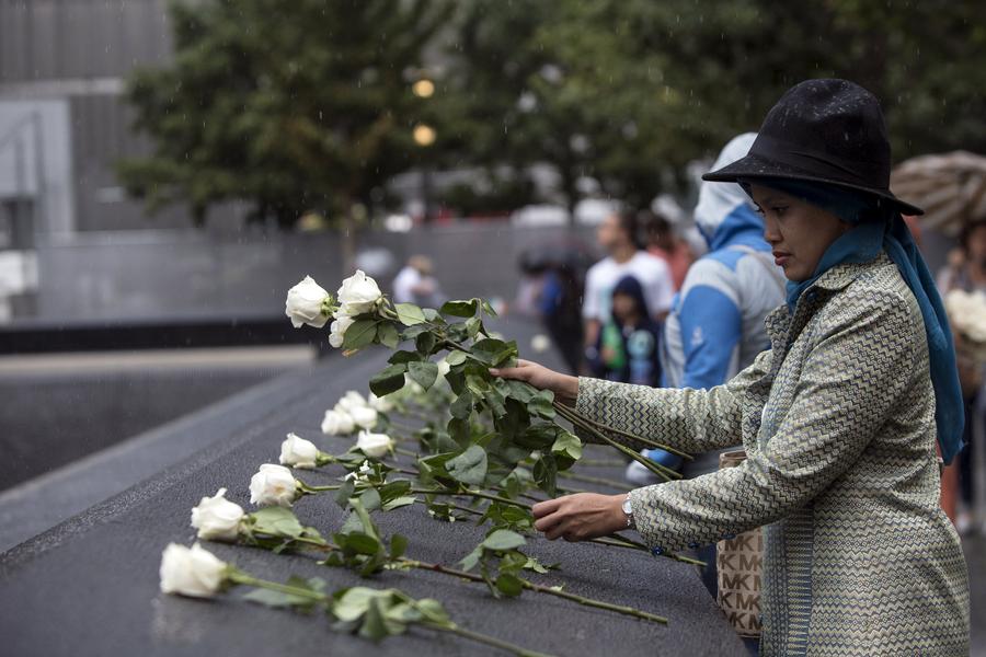 Americans mark the 14th anniversary of 9/11 attacks