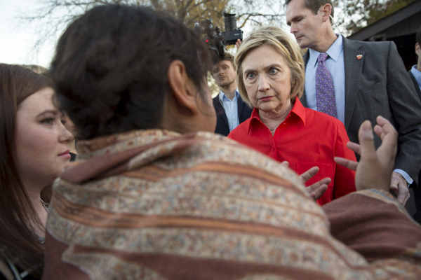 Clinton calls for US minimum wage increase to $12 an hour