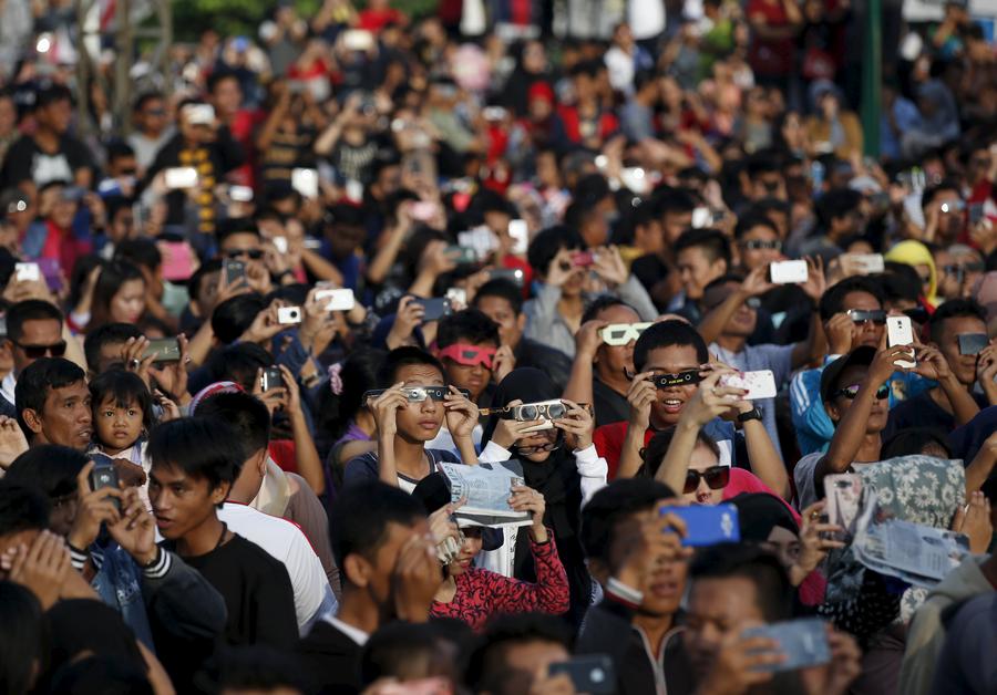 Solar eclipse captivates Asia and the Pacific