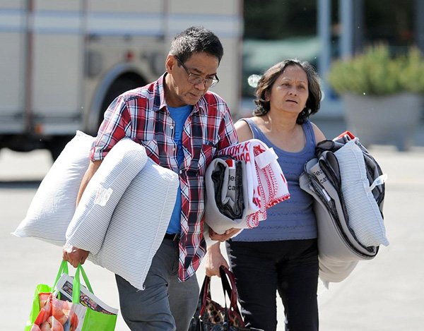 Epic wildfire threatens to engulf Canadian city as 88,000 flee