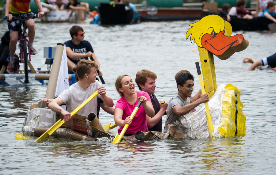 Cambridge students celebrate end of exams with cardboard boat race