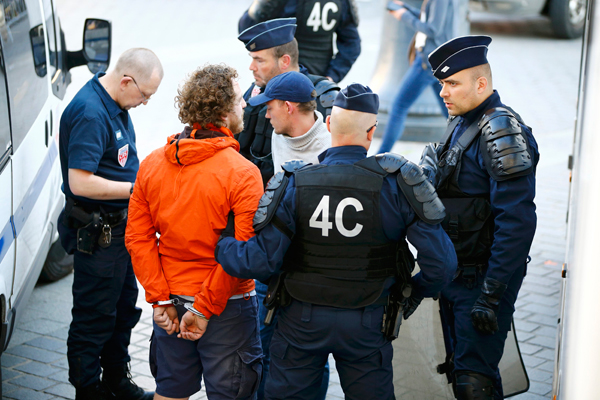 French riot police arrest 323 soccer fans on violence charges