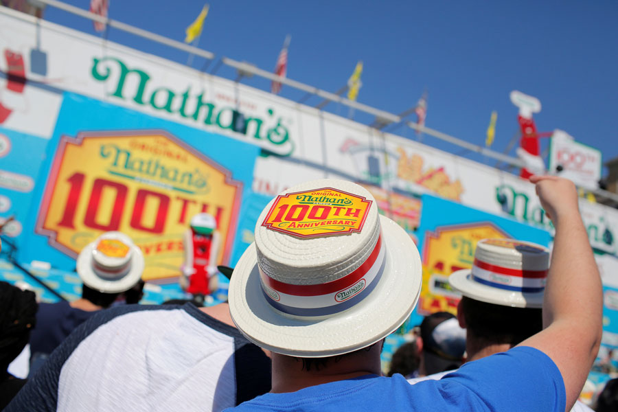 Hot dog-eating champ tastes victory again in US contest