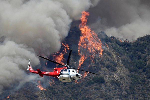 Wildfire chases 20,000 people from homes near Los Angeles