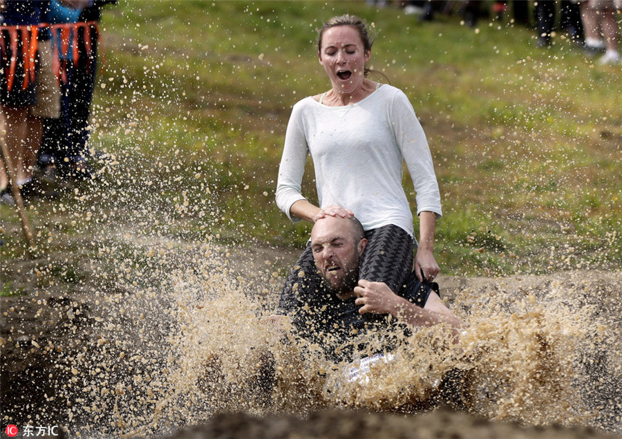 On men's shoulders: America's wife carrying champs